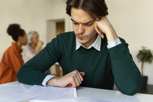 Sad person worried about low CRS score for Canadian Permanent Residency