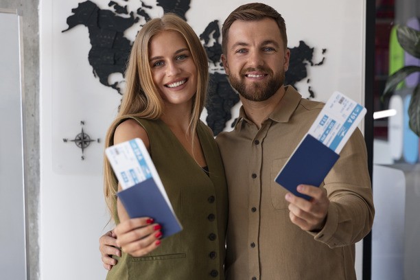 Happy couple showing their Spousal Work Permit Canada